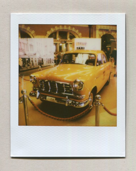 <strong>Yellow Cab</strong><br> <!-- title -->
September 2024<br> <!-- date -->
Scanned instant photo<br> <!-- medium -->
Polaroid Go Film<br> <!-- film stock -->
Polaroid Go Instant Camera<!-- camera/lens -->
<br><br>
<em> <!-- inspiration/motivation -->
Photo of a yellow cab on display at the 2024 NSW Transport Heritage Expo.
</em>
